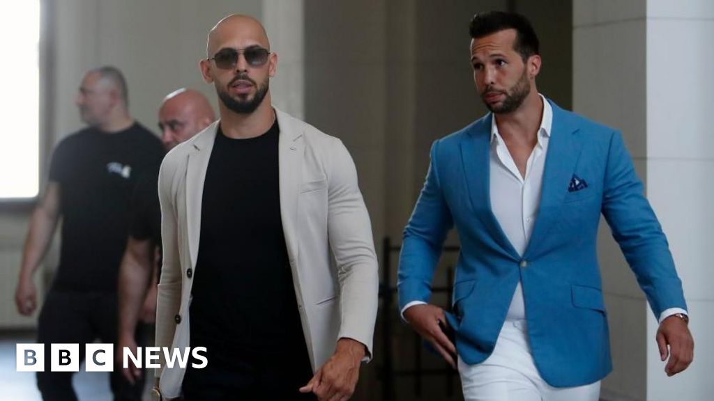 UK prosecutors say 21 charges authorised against Tate brothers