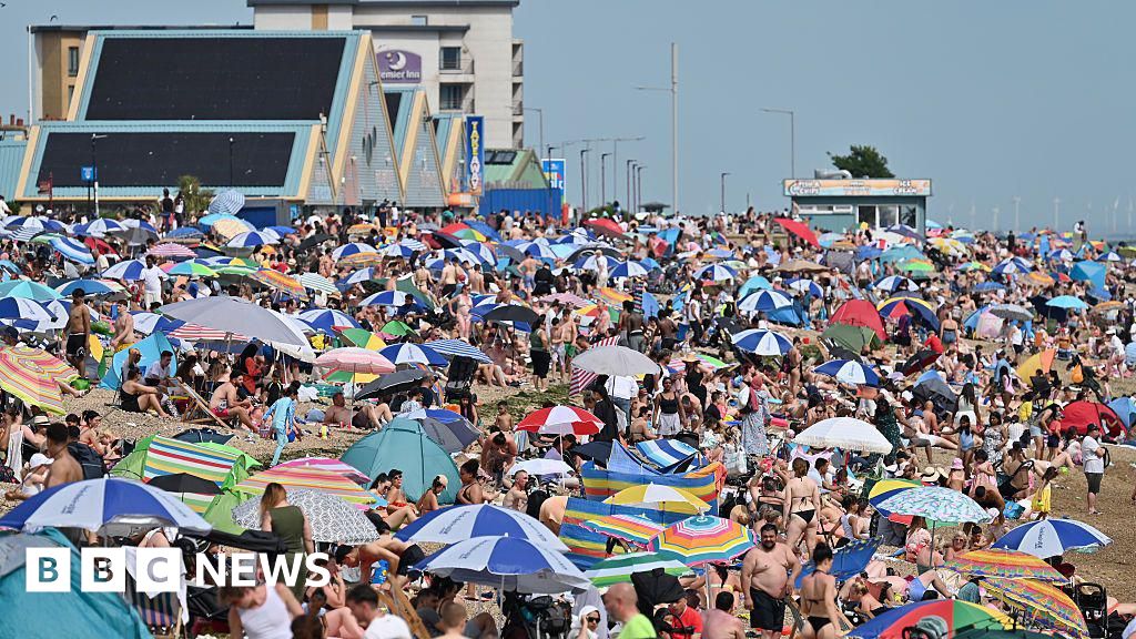 Millions face hosepipe bans as UK heatwave reaches 34.7C